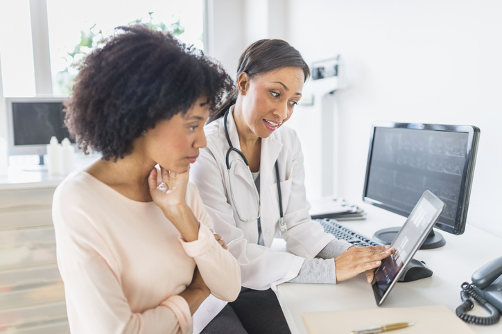 Doctor explaining test results to patient