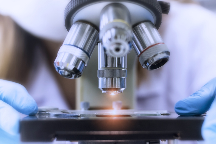 Photo shows a microscope in a laboratory/Getty Images